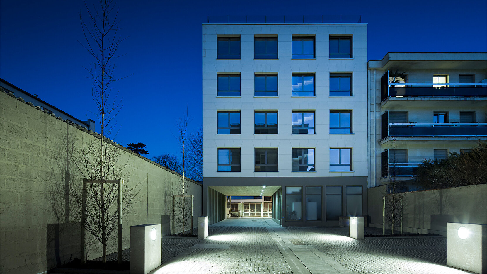 Façade des logements bénéficiants de la certification Habitat & Environnement Profil A et du label Qualitel Très Haute Performance Énergétique et Energies Renouvelables (THPE ENR) 2005