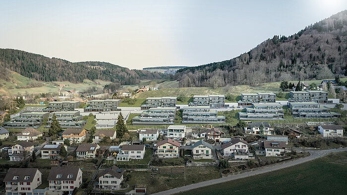 6 Doppeleinfamilienhäuser und 18 Terrassenhäuser mit Ausblick auf die Berner Alpen